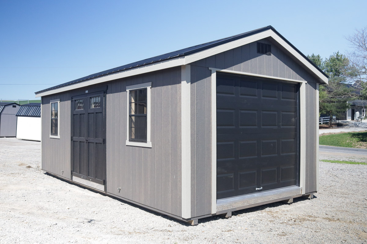 Storage building with roll-up garage door