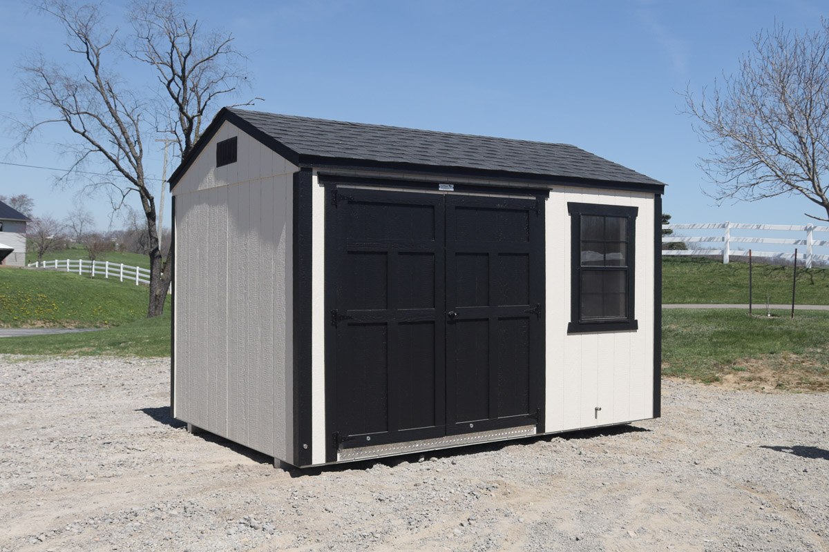 Gray and black storage shed with double doors