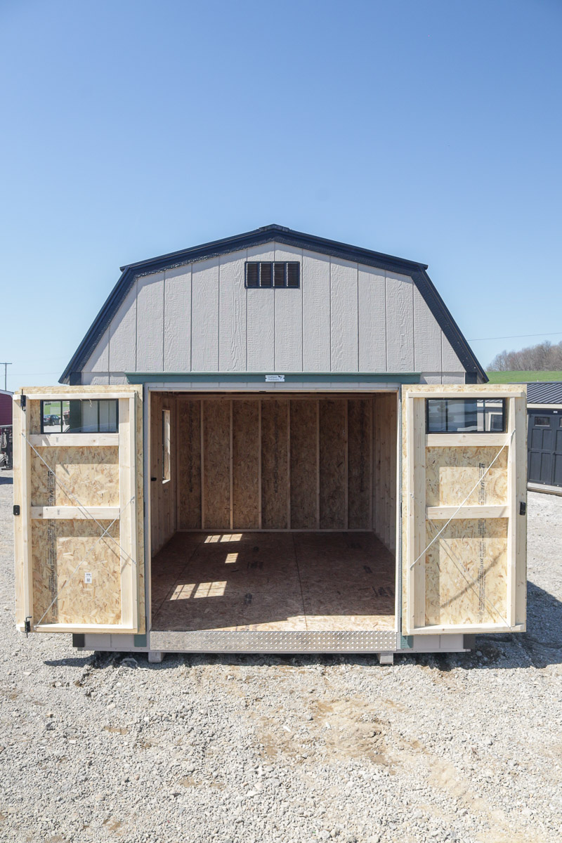 Lofted barn with double doors open showing spacious interior